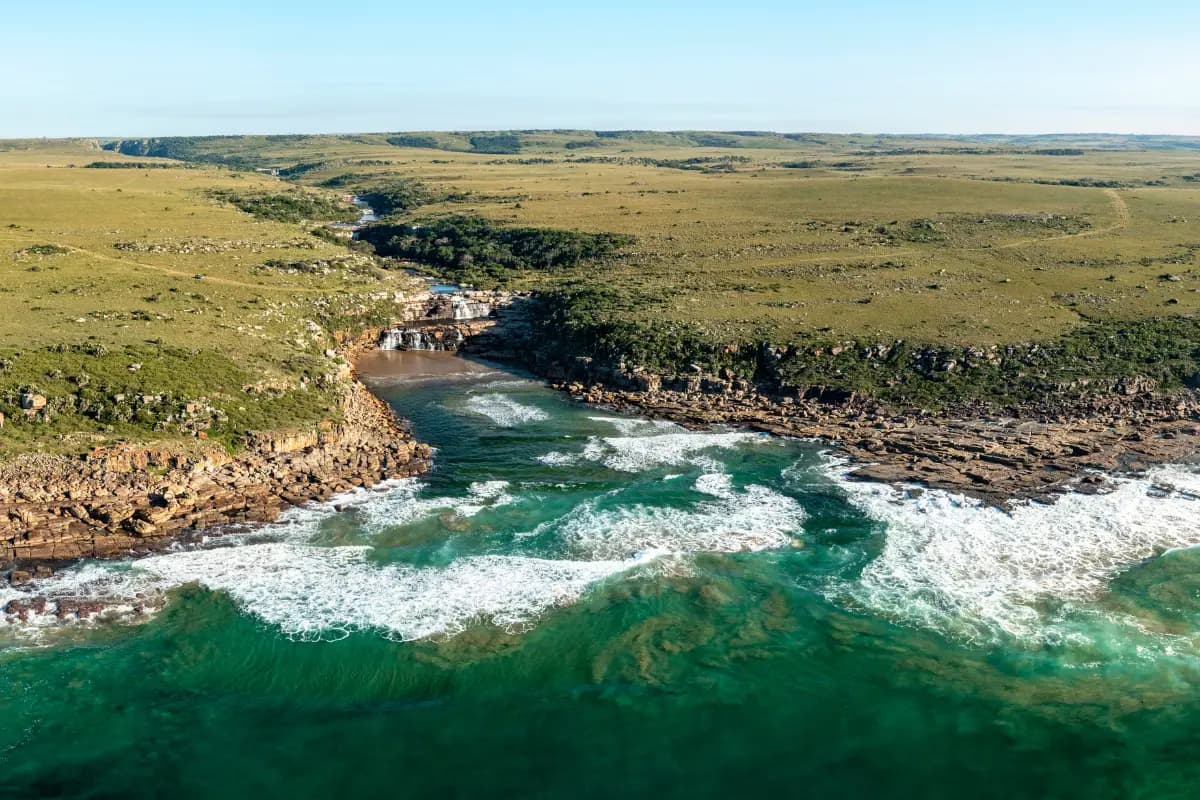 Aerial view of wild rocky coastline at Mkambathi Nature Reserve on South Africa's Wild Coast