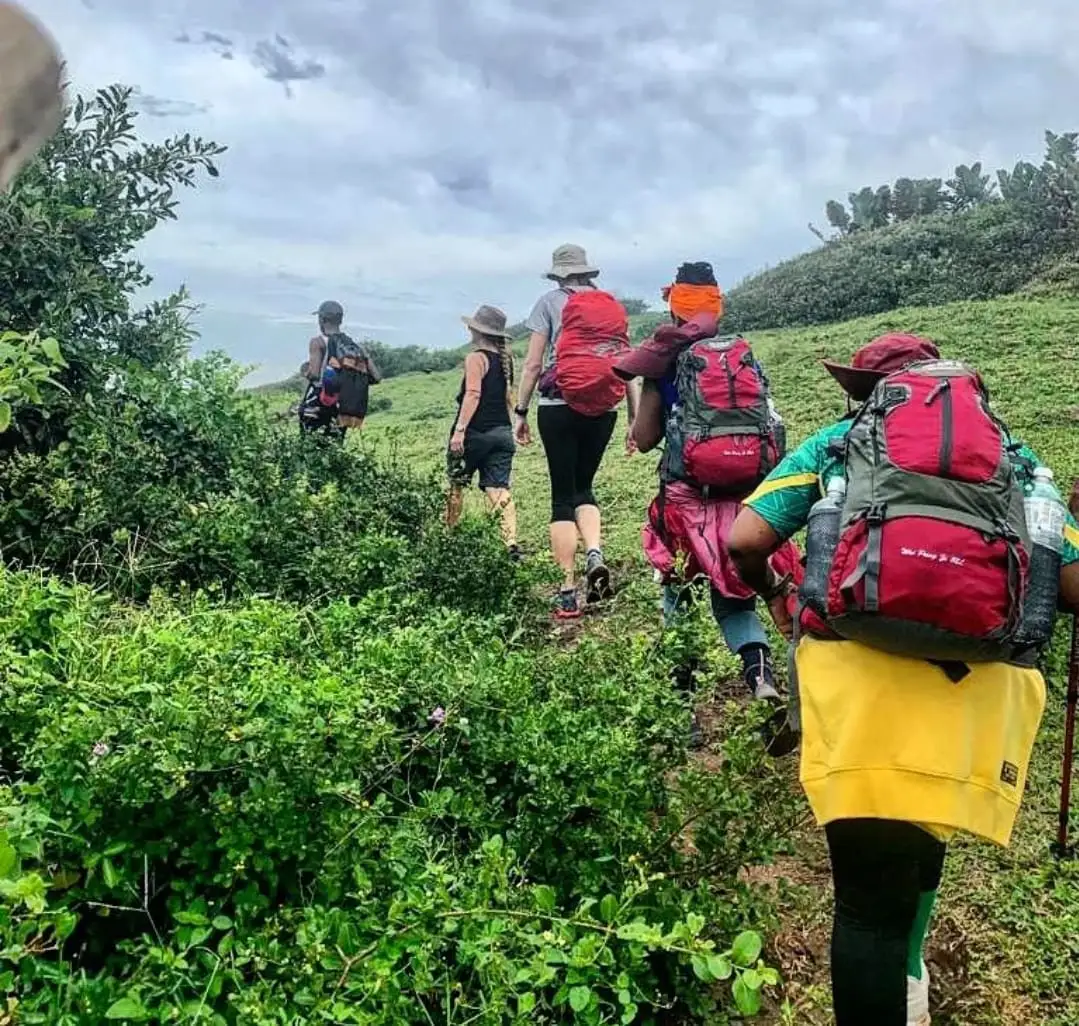 Group of hikers with backpacks on the Wild Coast trail, South Africa