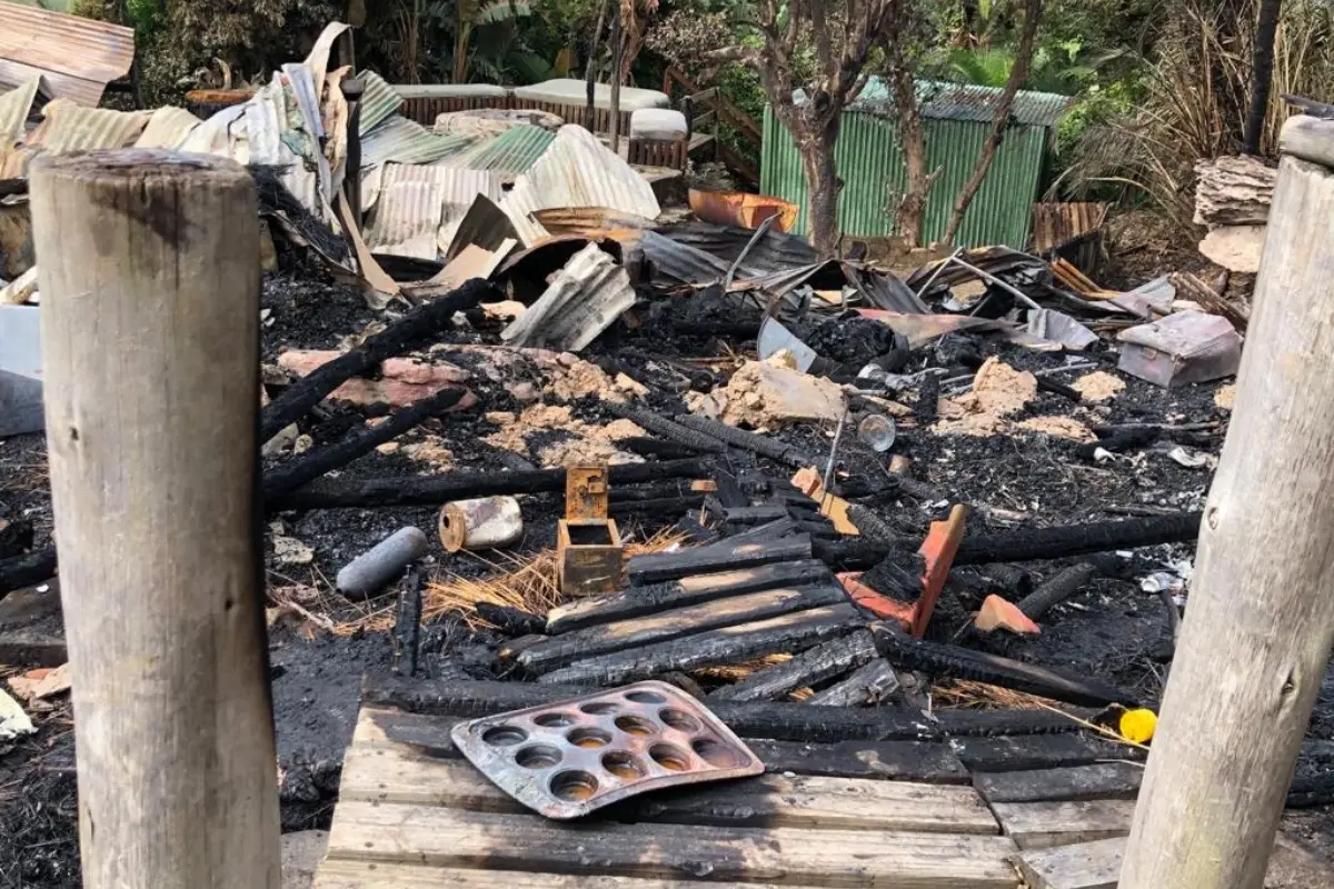 Charred ruins and ash-covered debris after the Mtentu Lodge fire on South Africa's Wild Coast