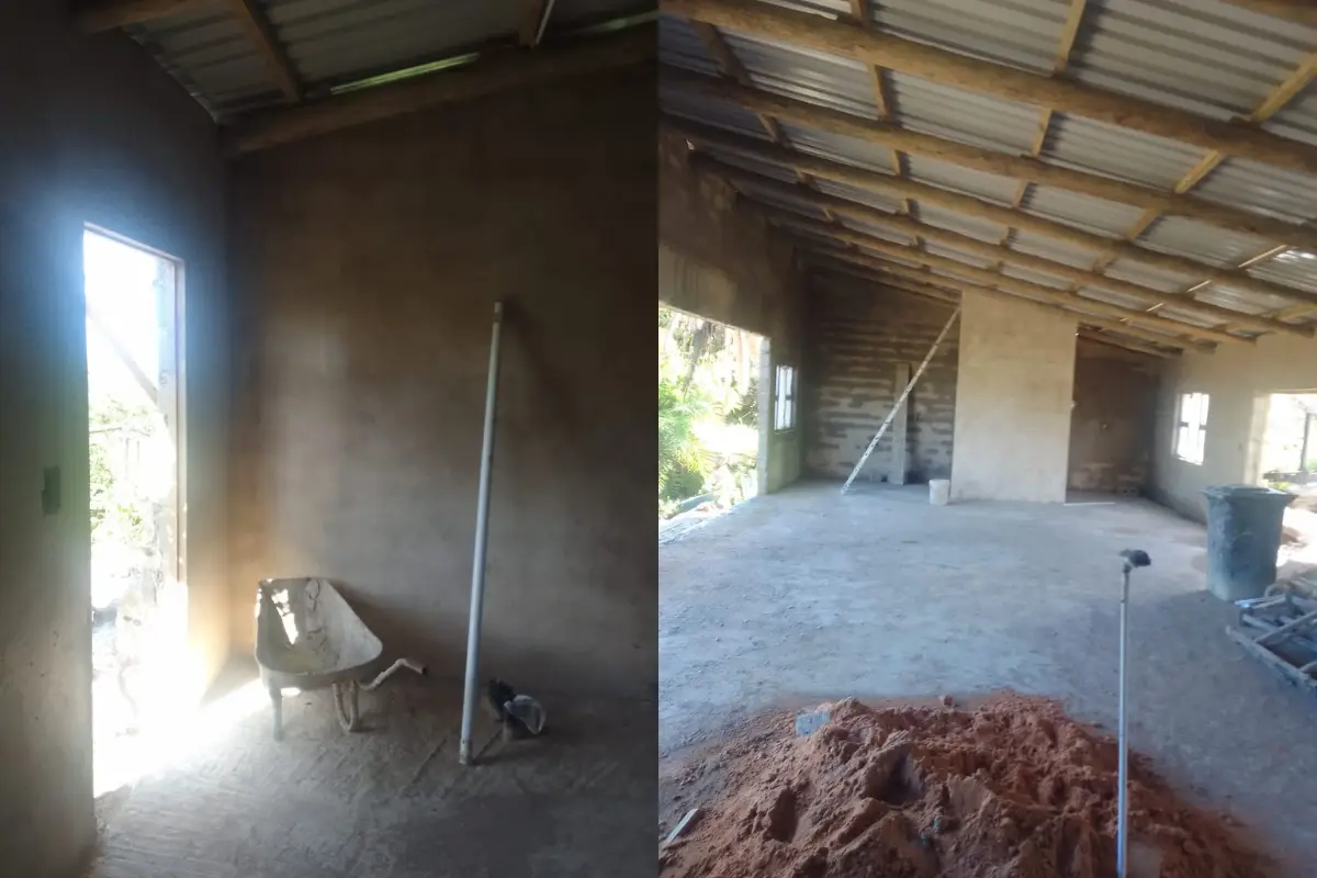 Interior and main room of Mtentu Lodge under reconstruction with mud-brick walls and corrugated iron roof