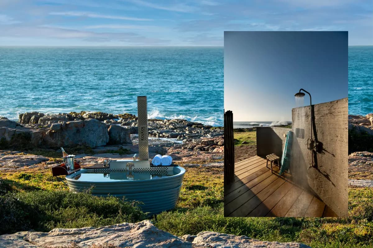 Outdoor bath on Wild Coast rocks and open-air shower on timber deck at Gwegwe Beach Lodge, Mkambathi